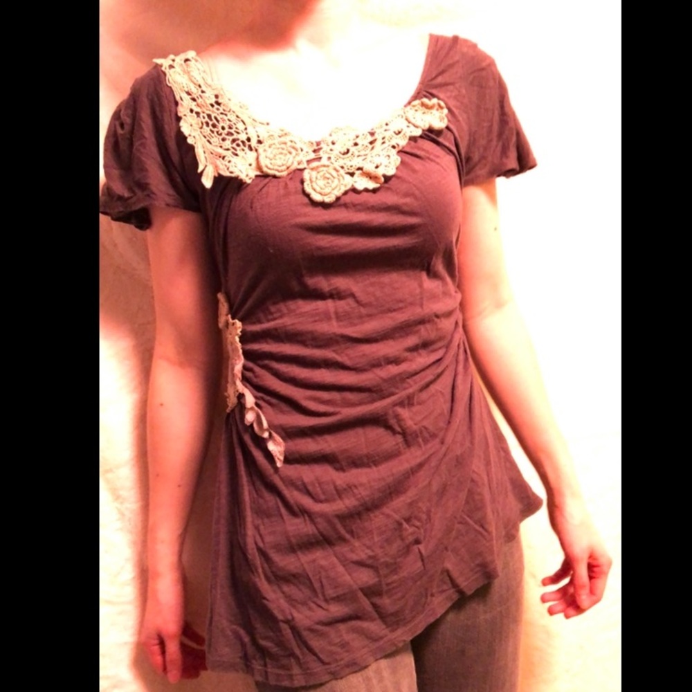 Ruched flowing top with crochet flower accents